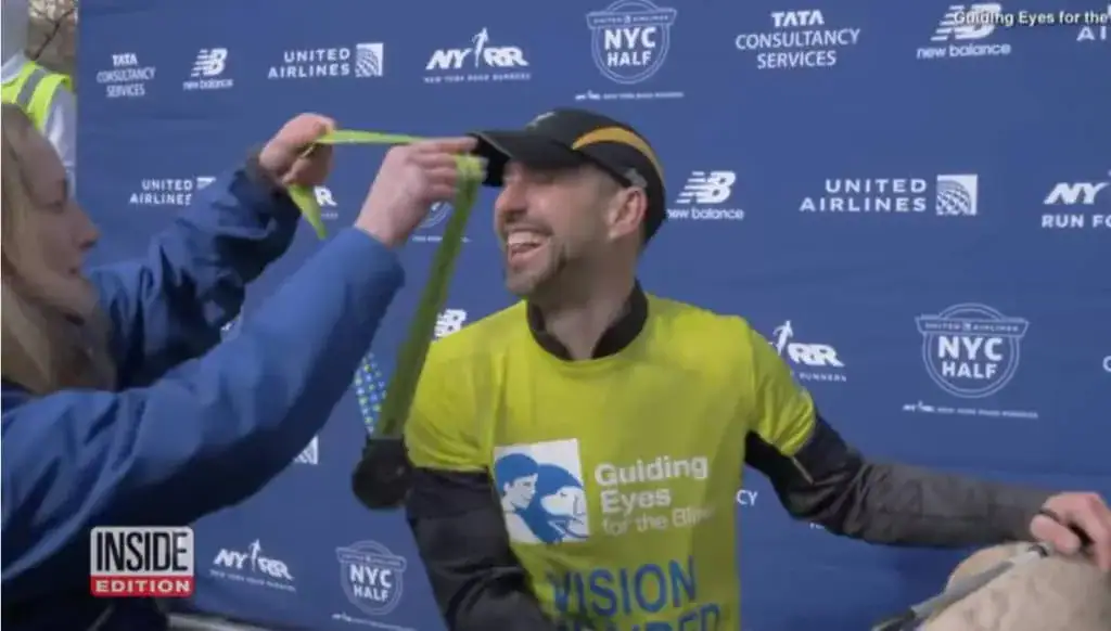 3 Labrador guide dogs help blind marathon runner make history