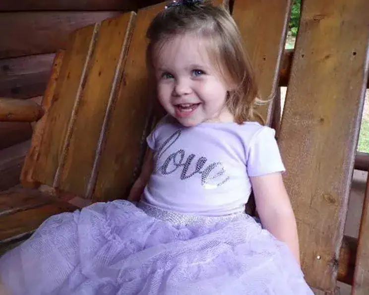 2-year-old fighting for her life after stray bullet hits her while playing on backyard slide