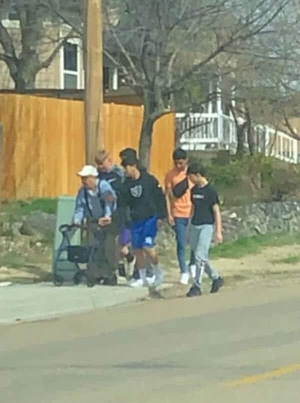 Group of teen boys help fallen elderly men when they thought no one was watching