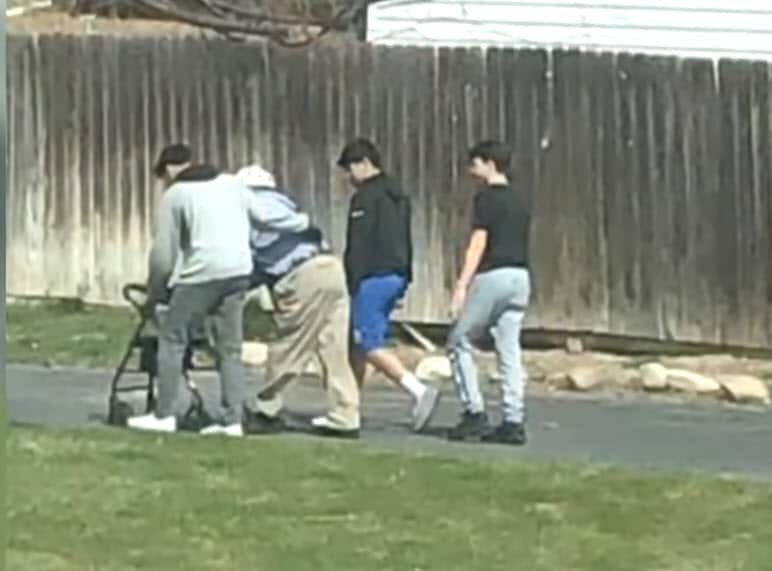 Group of teen boys help fallen elderly men when they thought no one was watching