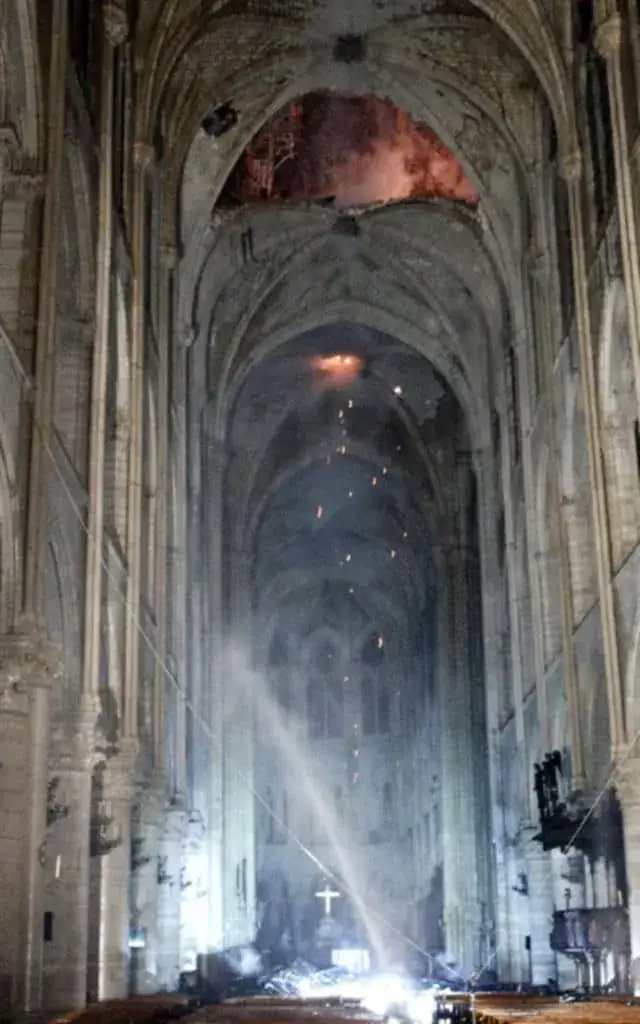 First look inside Notre Dame Cathedral reveals solitary cross standing amid the ruins