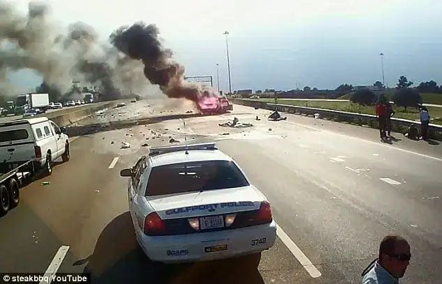 Trucker runs straight towards a fiery crash – dash cam captures moment he opens the car door
