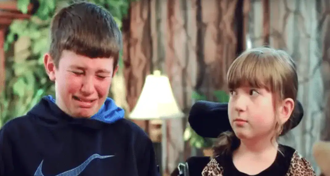 Wheelchair-bound girl is interview by tv when brother suddenly makes a tearful confession