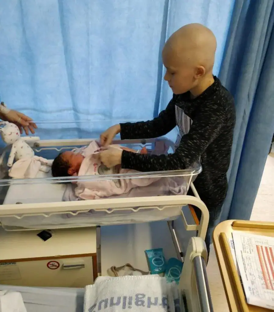 Boy with terminal cancer defies odds, hangs on to meet baby sister before dying on Christmas Eve