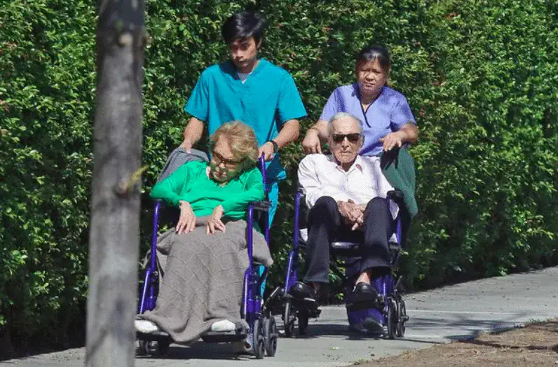Kirk Douglas, 102, and wife Anne Buydens, 100, are still inseparable after 65 years of marriage