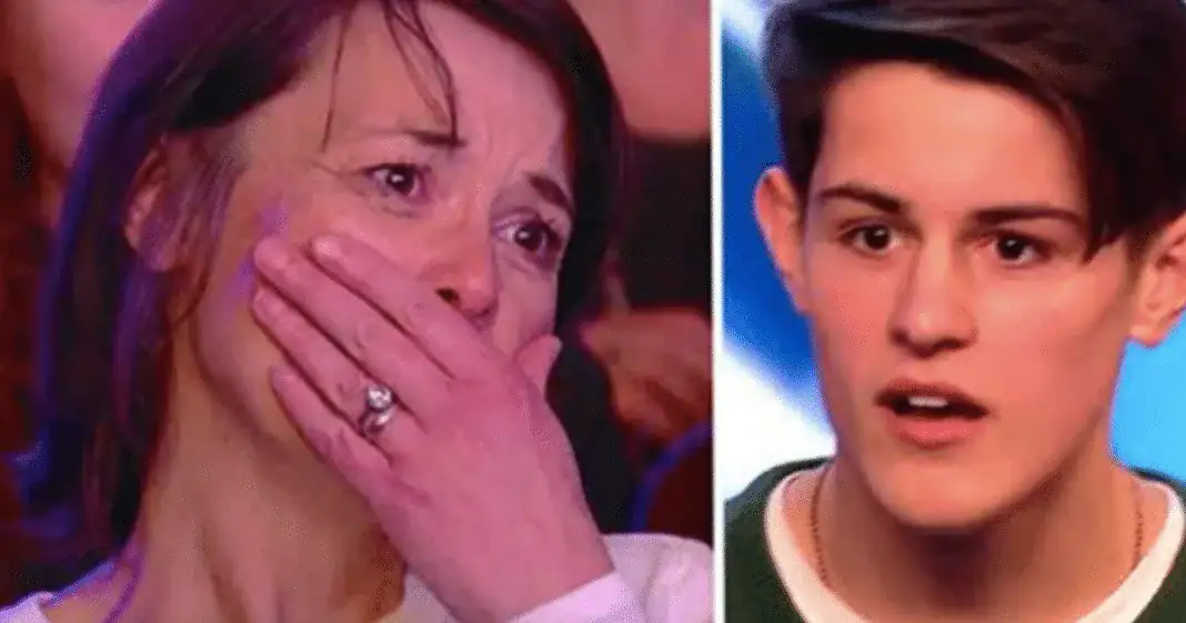 Teen gets on stage to sing, but first Simon Cowell tells him to look at the seat next to his mom