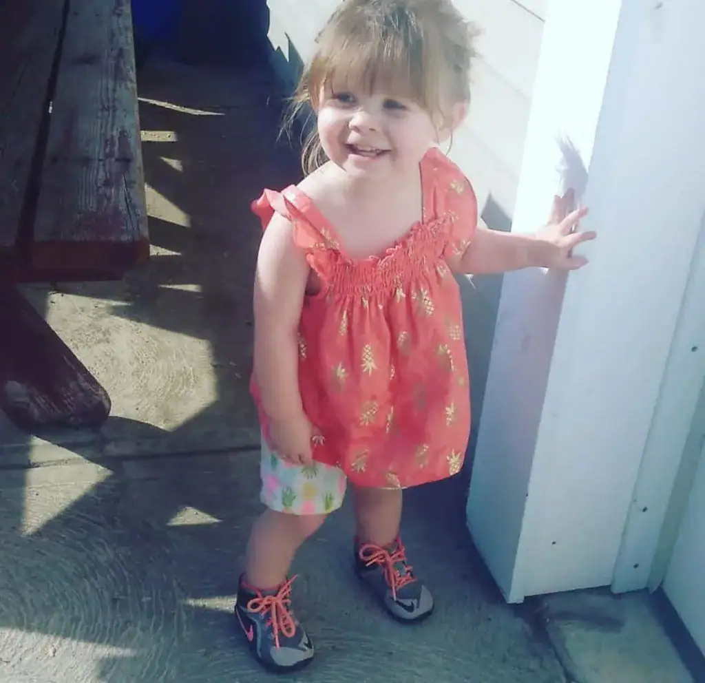 2-year-old fighting for her life after stray bullet hits her while playing on backyard slide
