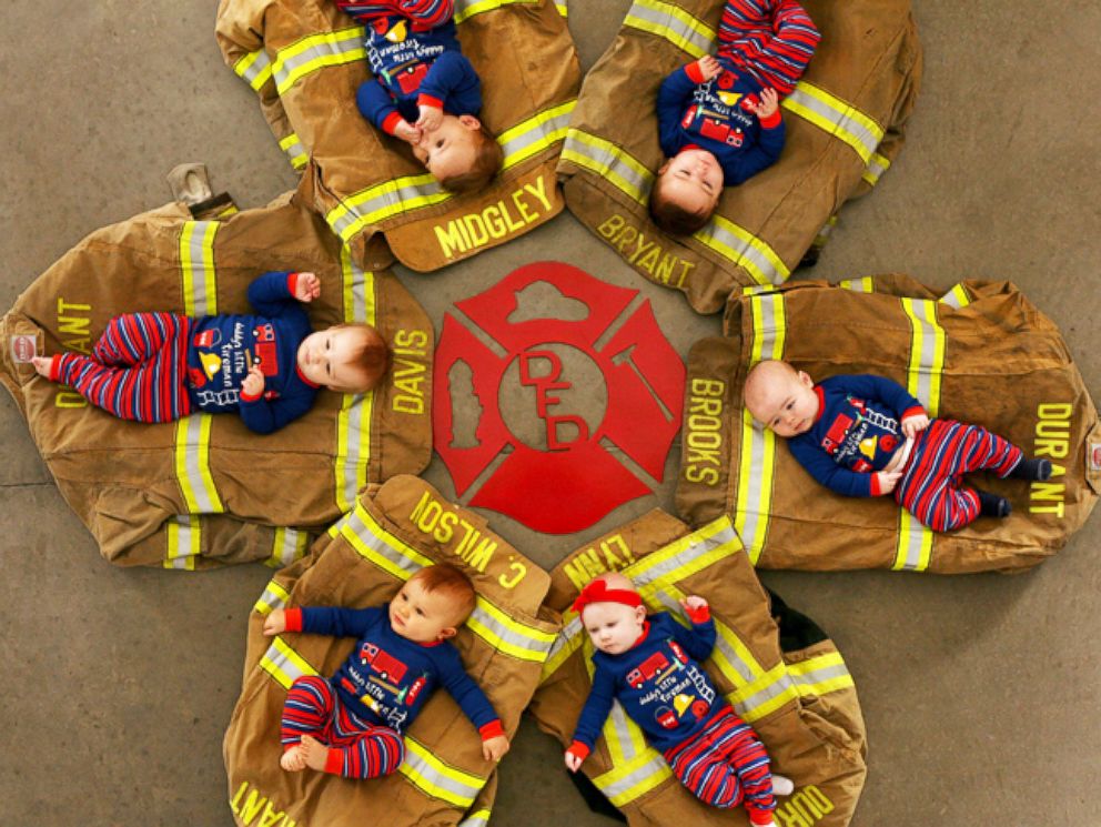 Six babies born to firefighters in Oklahoma pose for adorable fire station Christmas card. Richard Parker / Durant Fire Department