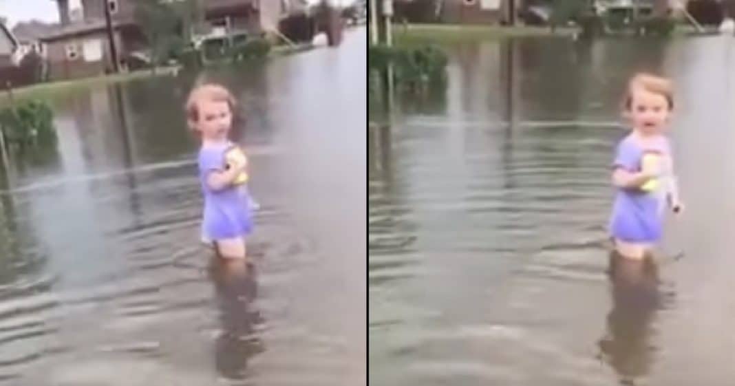 He Spots Toddler With Bottle Wading In Floodwater, Then Realizes Parents Are Nowhere To Be Seen