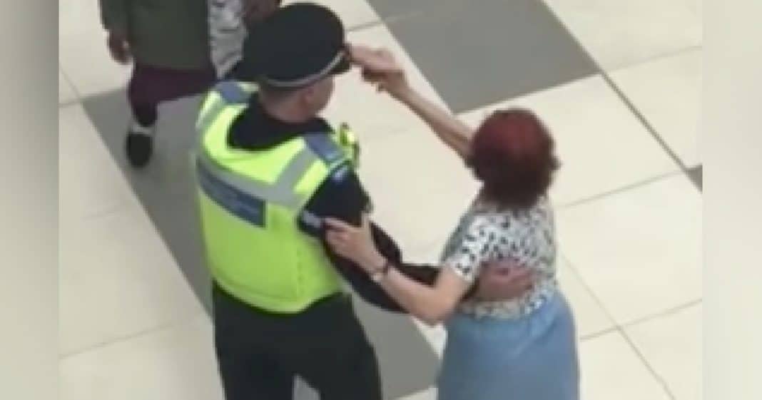 Cop Grabs Elderly Woman To Dance, Has No Idea Someone Is Filming When She Starts To Spin…