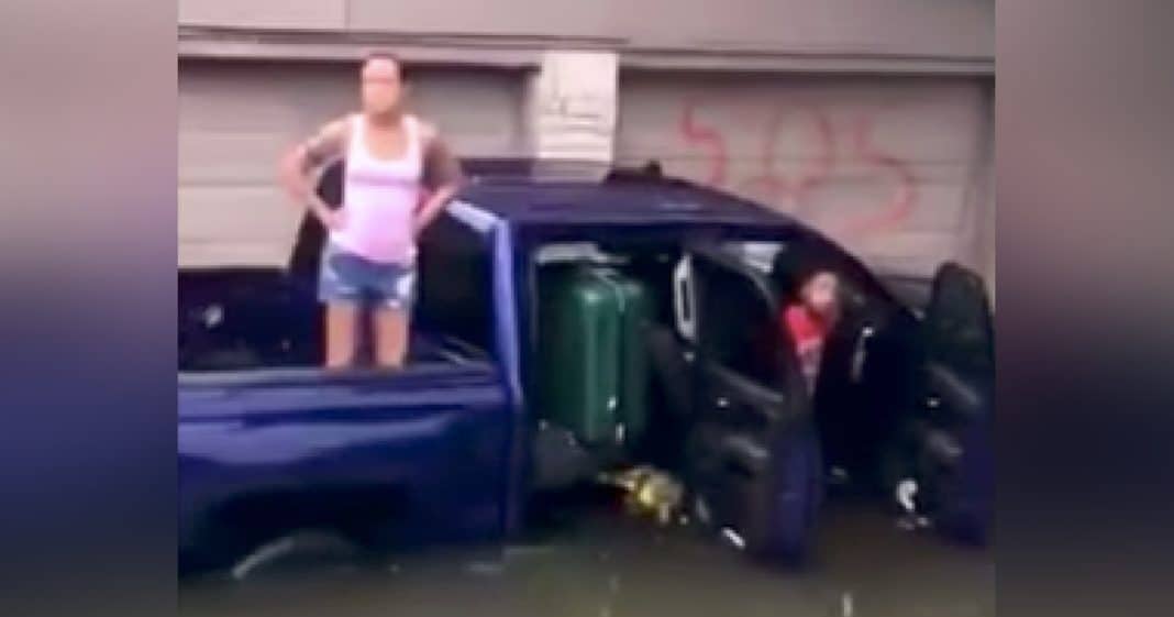 Mom And Son Trapped In Car Panic As Flood Waters Rise. Then She Looks Up, Sees Familiar Face