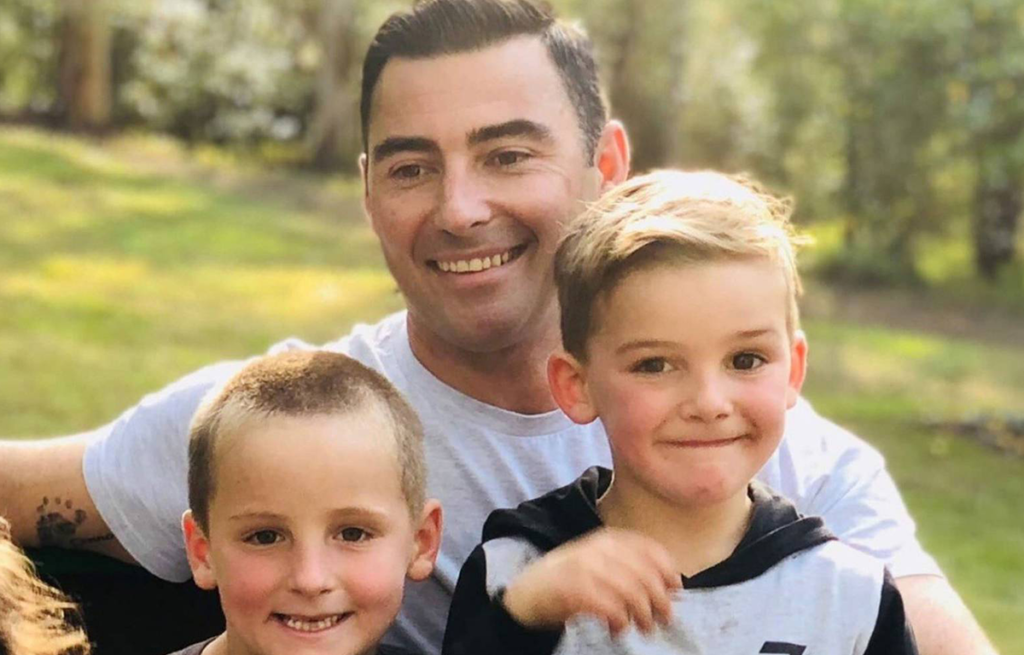 Brad Lewis with his sons, Oscar and Connor