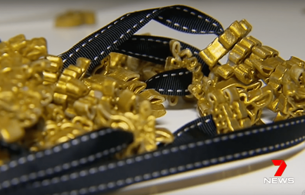 The gold-painted macaroni necklaces
