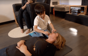 Lee Chatterson Wu teaches her sons CPR