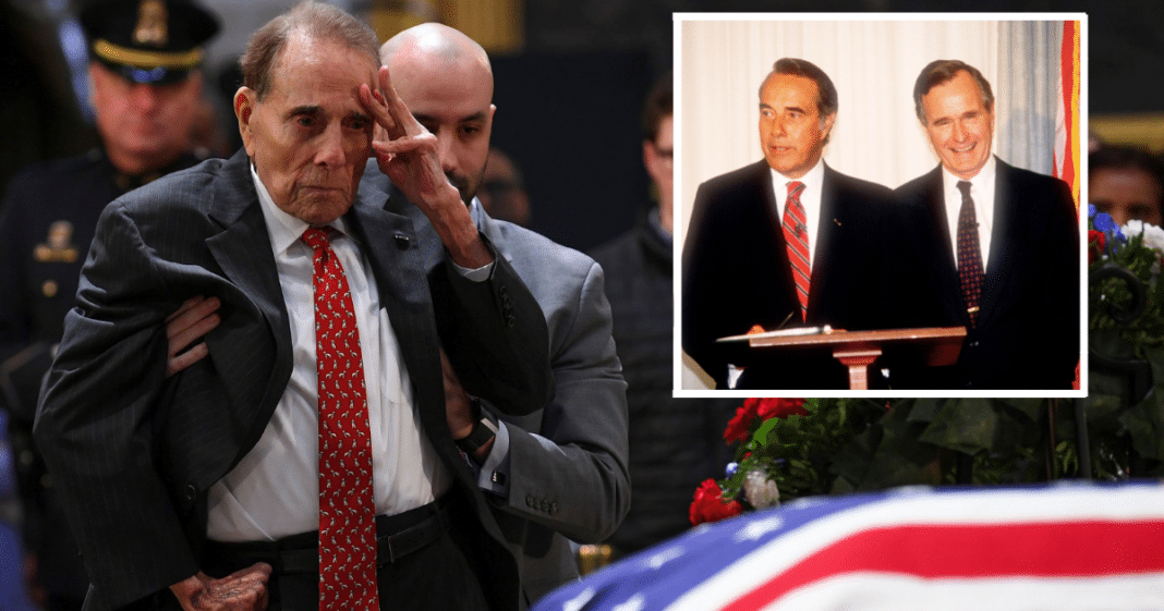 Sen. Bob Dole, 95, Stands Up From Wheelchair To Salute Fellow WWII Hero George H.W. Bush