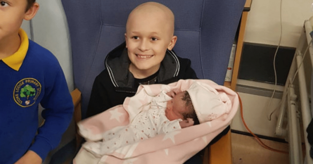 Boy with terminal cancer defies odds, hangs on to meet baby sister before dying on Christmas Eve
