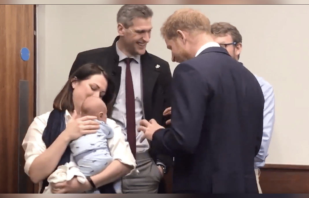 Prince Harry meets Jame Chalmer, infant