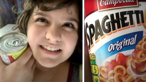 Girl holding a can of SpaghettiOs
